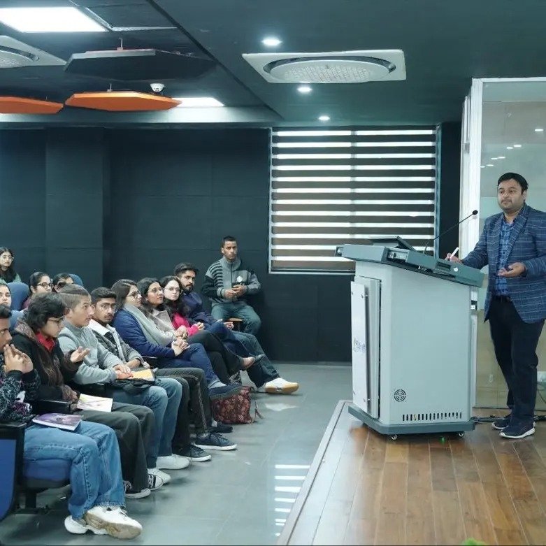 Saurabh Thakral leading a Mandarin training session for a room of executives